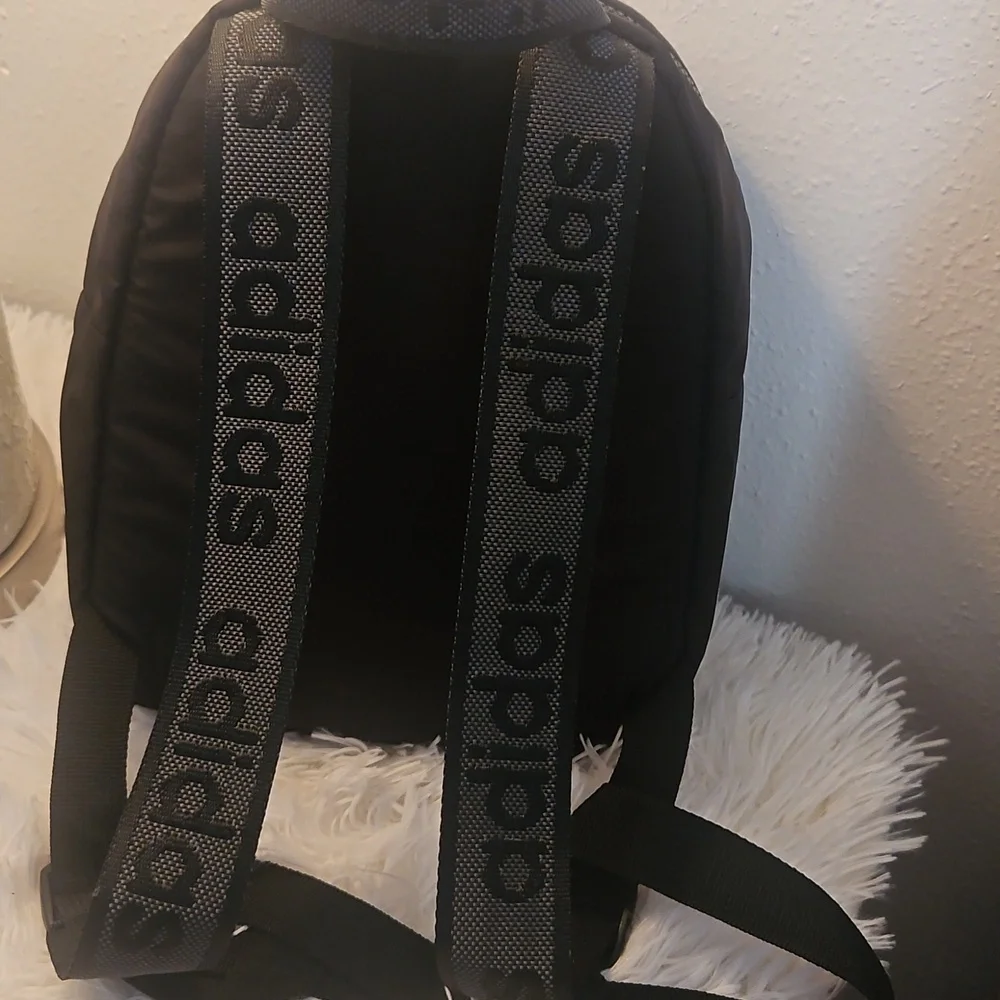 Adidas Black Backpack with Minimalist Design